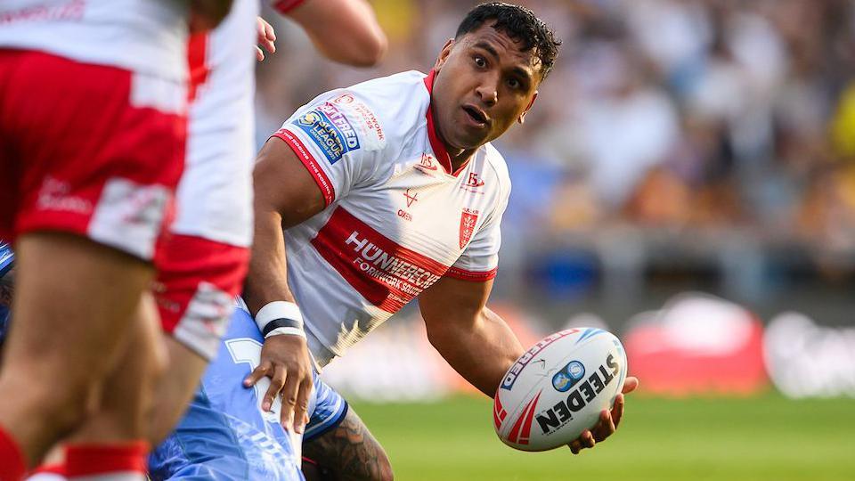 Hull KR's Tevita Pangai Junior holds the ball in his left hand in action against Leeds Rhinos in June.