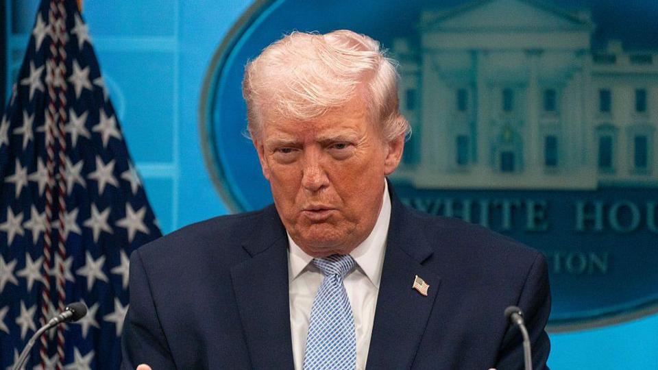 U.S. President Donald Trump speaks to reporters at a briefing on Monday, April 6, 2026 at the White House in Washington