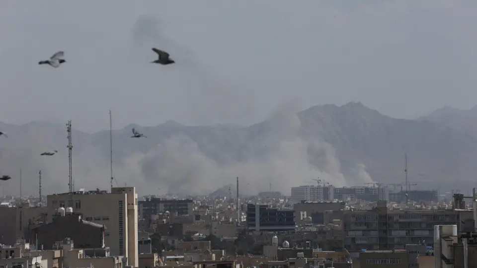 Aftermath of what appears to have been a strike in Tehran, with smoke going up in the air from buildings