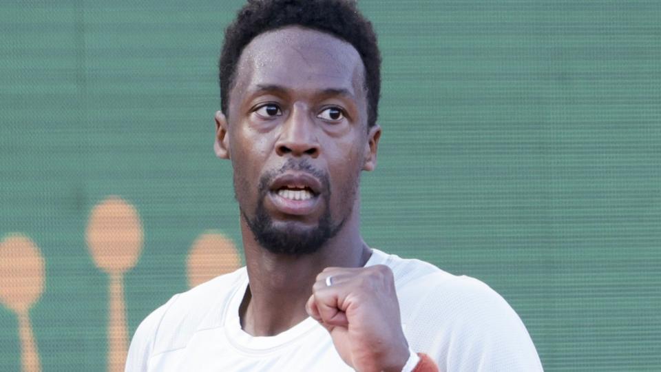 Gael Monfils celebrates with a clenched fist