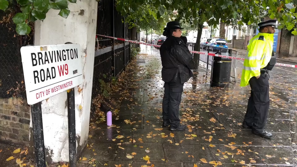 Police at Bravington Road in Queen's Park