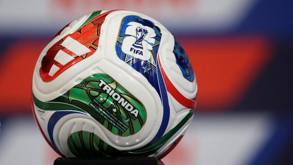 The green, red, white and blue Adidas Trionda football.