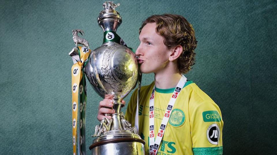 Josh Lock kisses the Welsh Cup