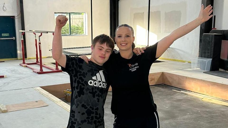 Lloyd with his gymnastic coach Josie Rice