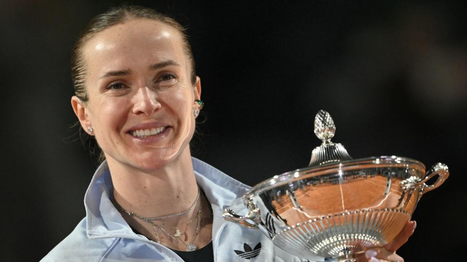 Ukraine's Elina Svitolina holds the trophy after winning the Italian Open final