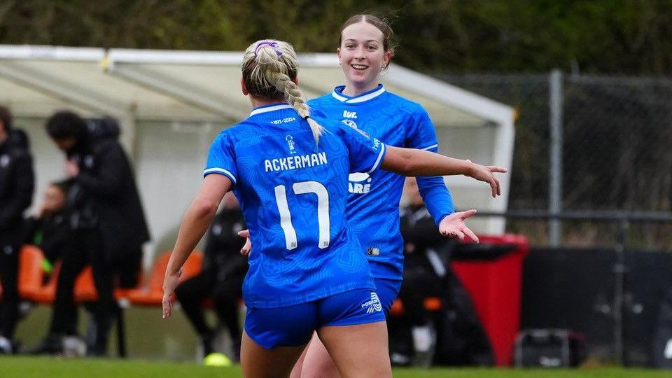 Gwalia United's Molly Kehoe (right) celebrates with team-mate Daisy Ackerman