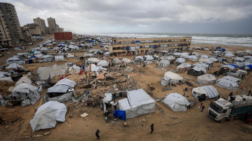 Tents used by displaced people on a beach during a windy winter day in Gaza City, northern Gaza (13 January 2026)