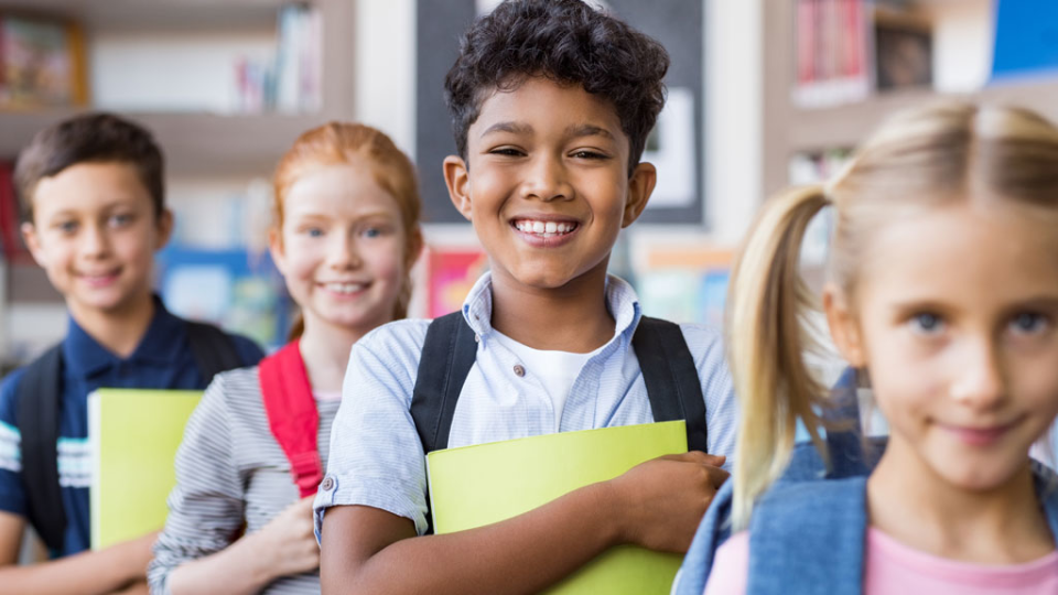 Children line up ready for school