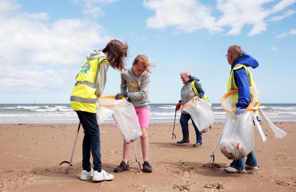 Volunteers from Friends of Redcar picking litter up