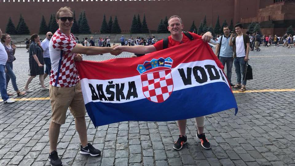 David Hancock (right) with a Croatia fan in Moscow during the 2018 World Cup 