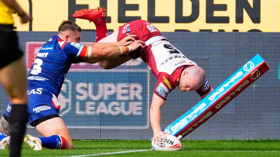 Liam Marshall diving in the corner to score an acrobatic try.