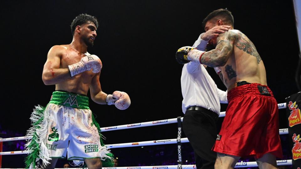 Referee stops the fight between Adam Azim and Steve Claggett