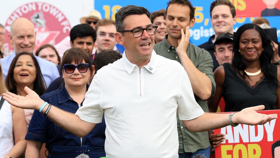 New Labour Party MP for Makerfield, Andy Burnham speaks to supporters and members of the media, the morning after his by-election victory, at Ashton Town FC, in Ashton in Makerfield, north-west England on June 19, 2026.