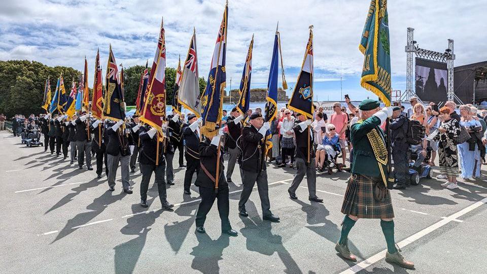 Stand bearers on parade