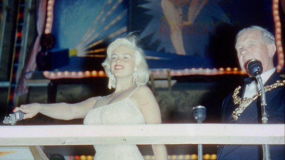Hollywood star Jayne Mansfield with platinum blonde hair and white dress switching on the Blackpool Illuminations in 1959.