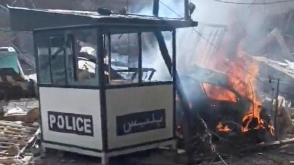 Fire outside police checkpoint in Tehran, seemingly after US-Israeli strike