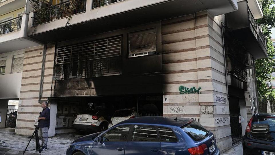 damage after a gas canister bomb exploded at the entrance of a building in Thessaloniki on July 1, 2026