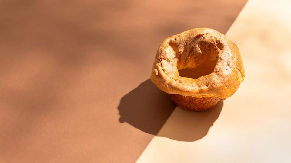 Yorkshire pudding on a two-tone brown background