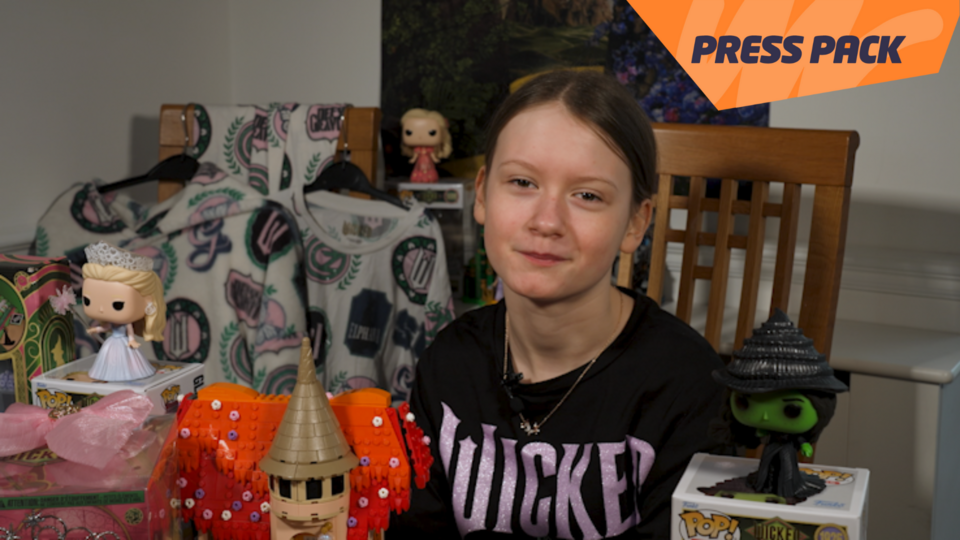 Evie with Wicked merch