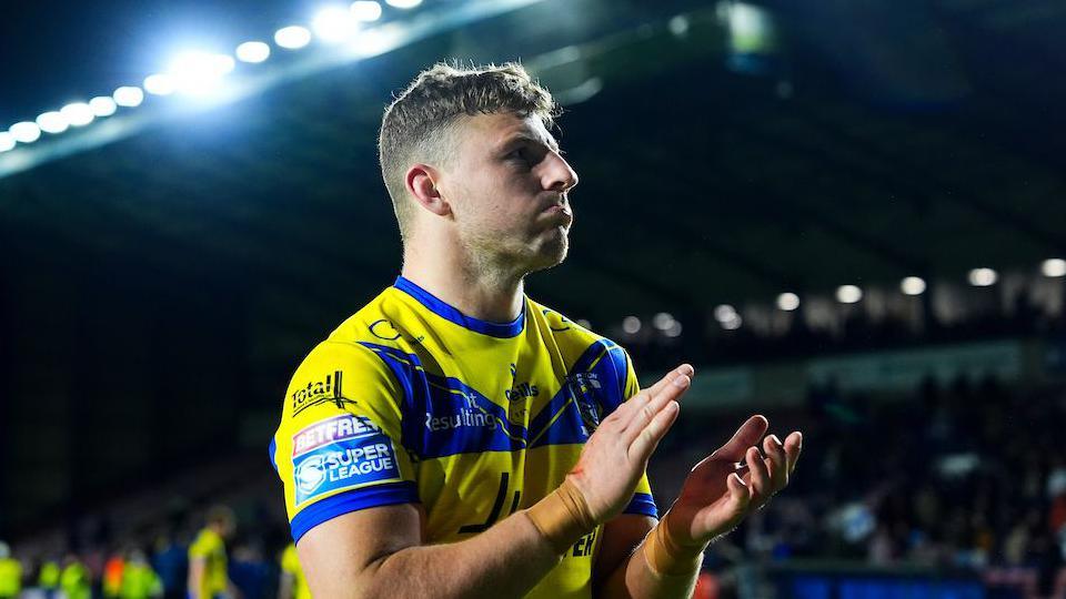 Warrington Wolves' George Williams clapping the fans