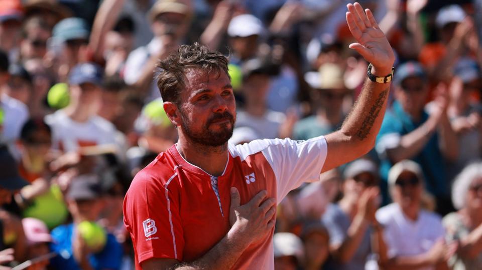 Stan Wawrinka waves to the crowd