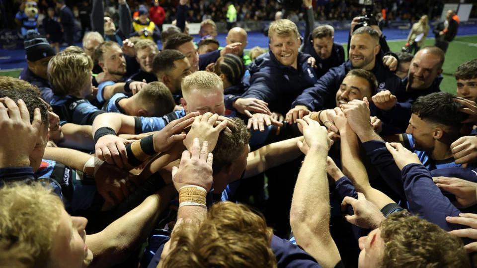 Cardiff players in a huddle