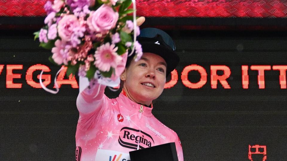 Dutch rider Anna van der Breggen wearing the pink jersey on the podium