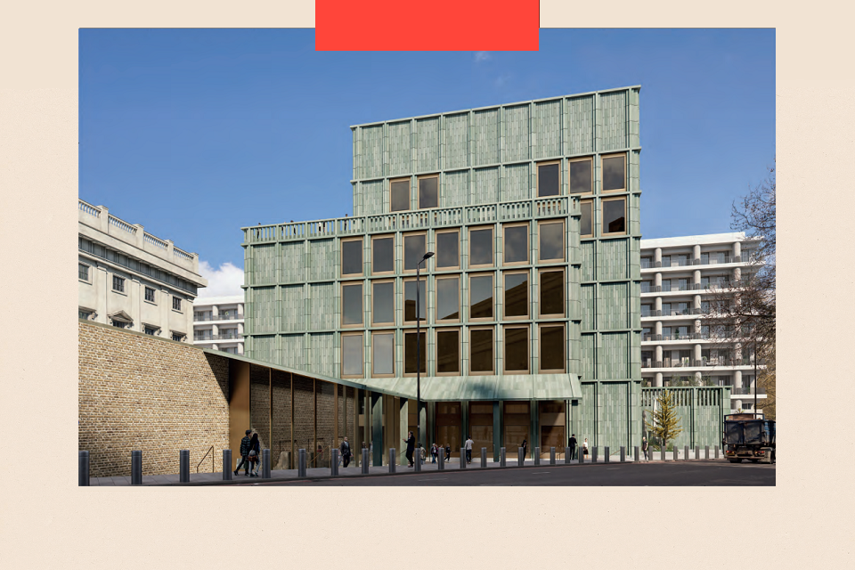 A seven storey building with floor to ceiling windows