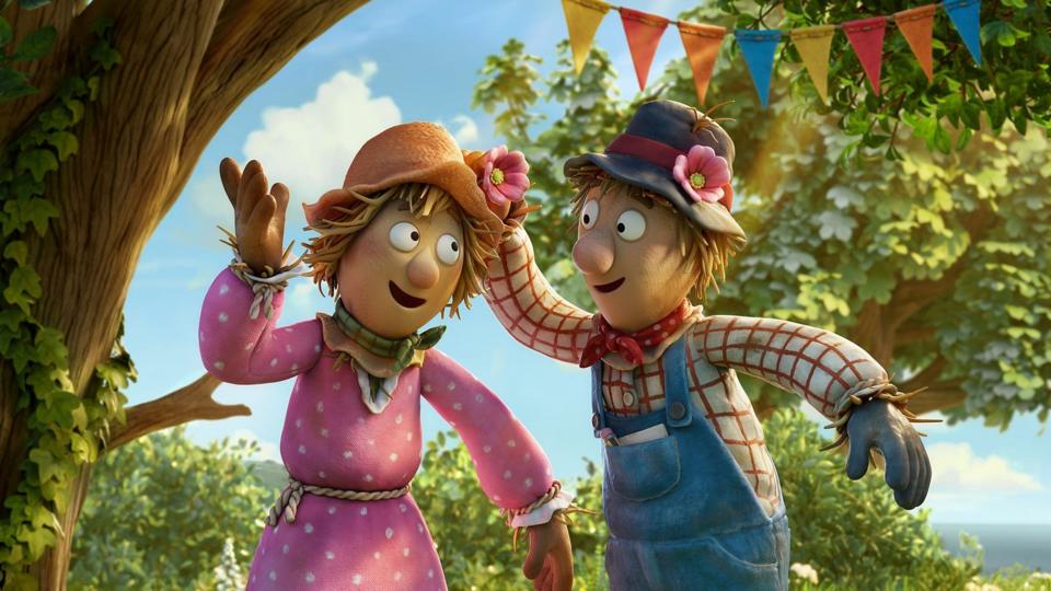 two scarecrows dancing