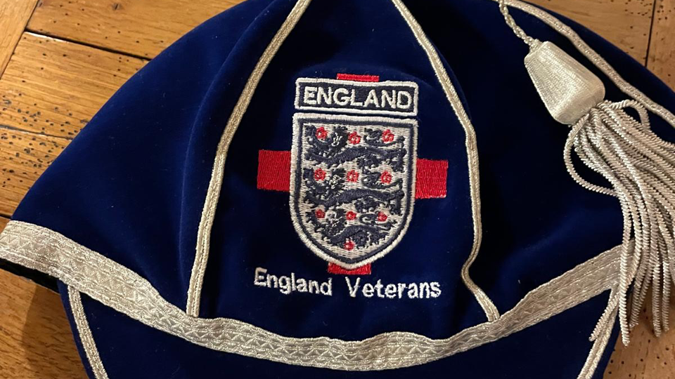 Drew Warren's new cap for England Veterans with the England logo.