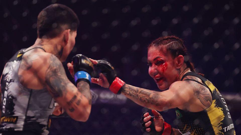 Blood pours from Cris Cyborg's face