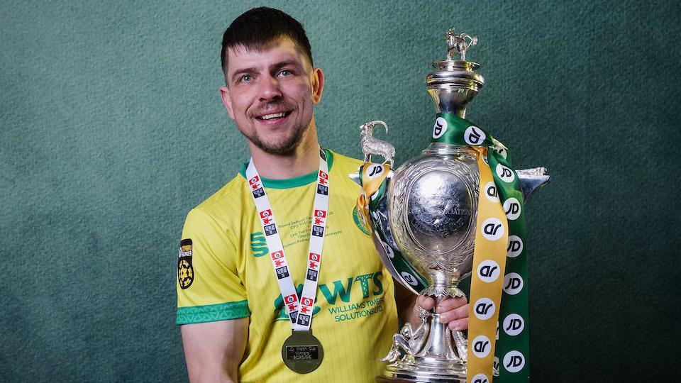 Darren Thomas holds the Welsh Cup