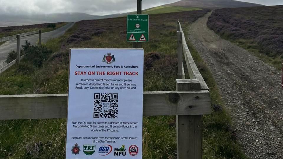 A poster warning people not to ride off track on green lanes