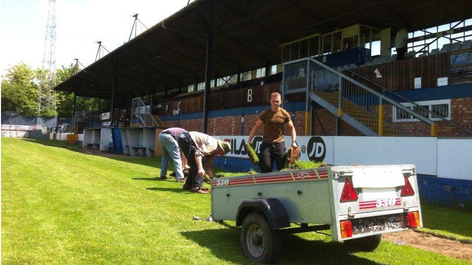 Worcester City fans taking away the pitch at St George's Lane