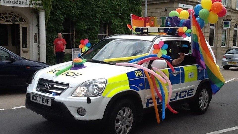 Decorated police car in Swindon Pride parade