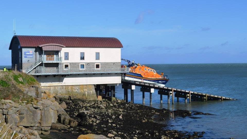 The new Moelfre RNLI lifeboat station with the lifeboat Kiwi on the slipway