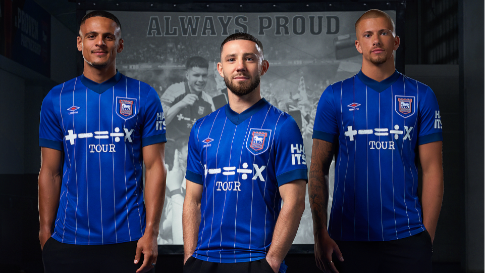 Ali Al-Hamadi, Conor Chaplin and Harry Clarke model Ipswich Town's new home shirt.