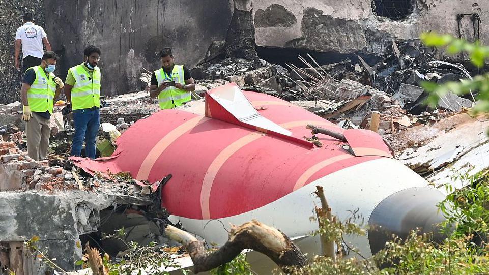 Wreckage of the Air India plane at the crash site in Ahmedabad, India. The Air India flight, which was bound for London, crashed shortly after taking off from Ahmedabad Airport.