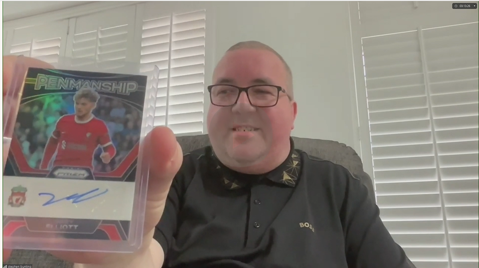 Stephen Bunting holds a signed Harvey Elliott card