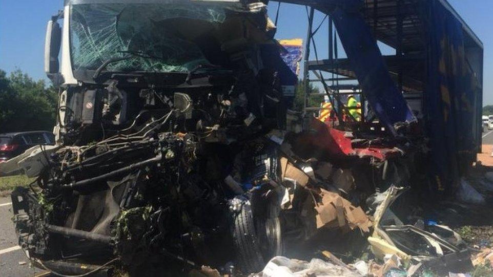 One of the crashed lorries