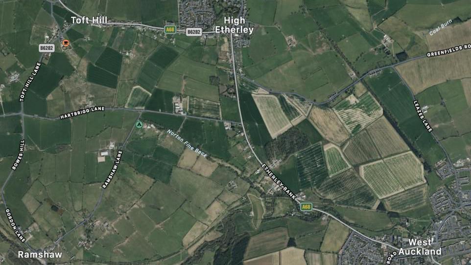 An aerial map of the area around High Etherley. The A68 can be seen running from West Auckland in the south west of the map to High Etherley in the north. It then progresses west to Toft Hill. Fields surround the towns.