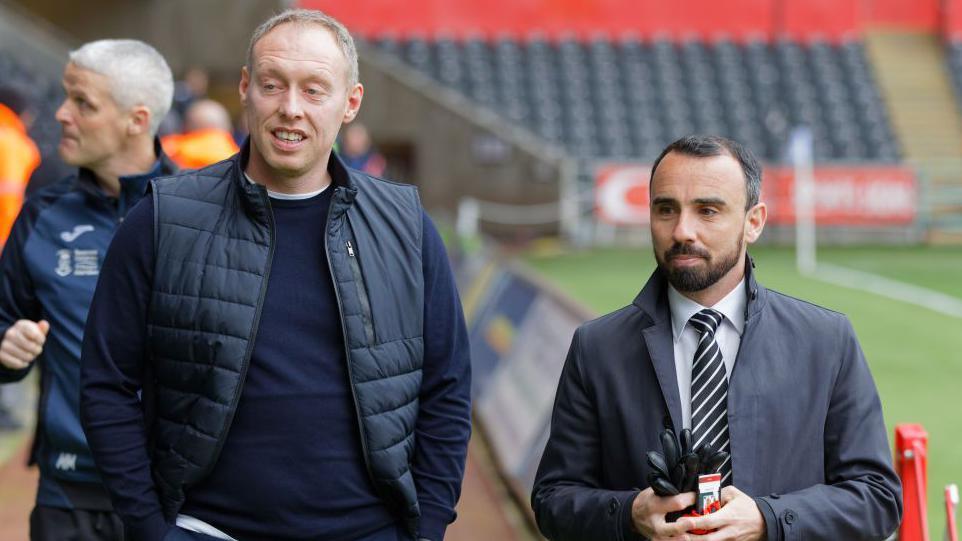 Leon Britton alongside Steve Cooper in 2020