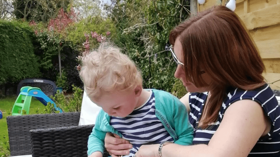 Rose O'Leary Hall reading with her mum Sue