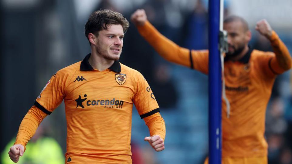 Hull City celebrate their second-half goal against Millwall