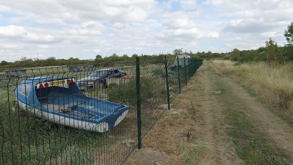 A six foot high fence which has begun being installed around part of the Swanscombe Peninsula used by Broadness Cruising Club.