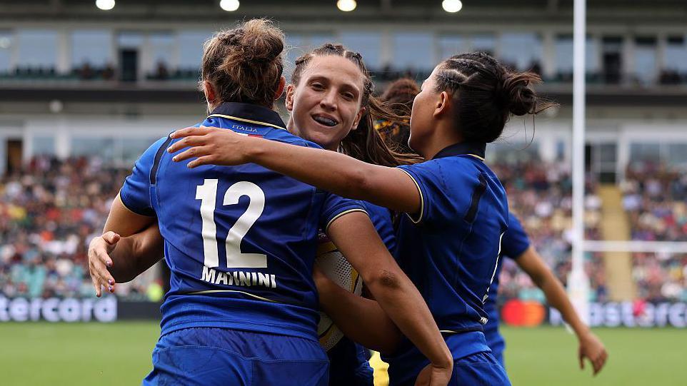  Giada Corradini of Italy celebrates scoring her team's seventh try