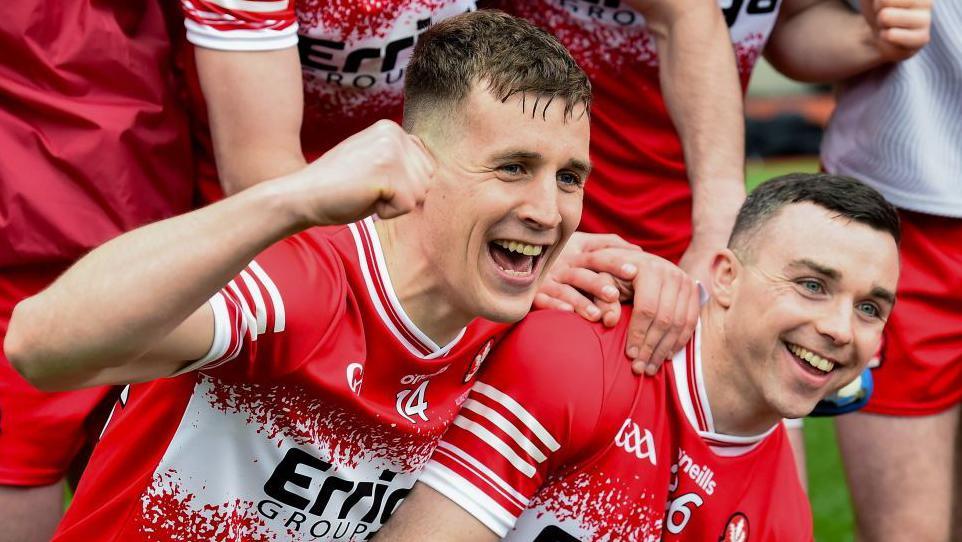 Shane McGuigan and Niall Toner celebrate Derry's Division One title win 