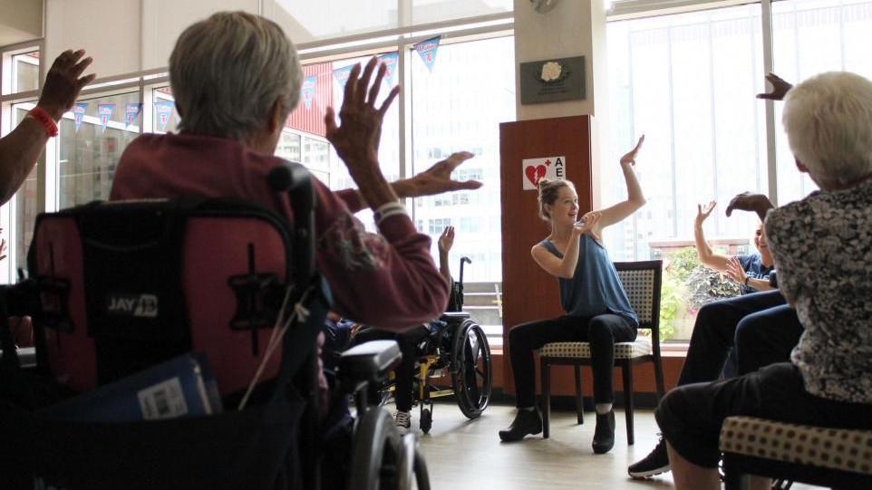 Emily Davis conducting a movement class