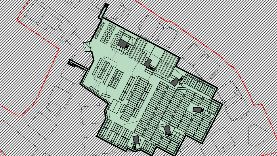 Architectural drawings showing the layout of the basement bus garage, with about 190 rectangular blocks representing the buses in a shaded green space