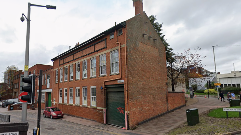 A large two-storey brick bakery building